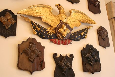 A collection of fire marks from the Ben Frankin–founded Philadelphia Contributionship. 