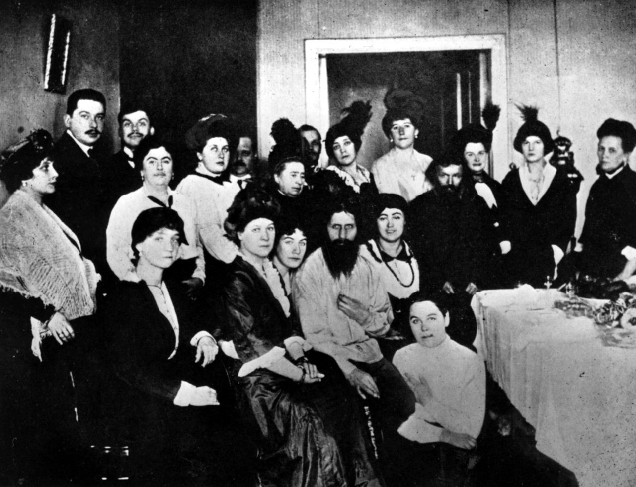 Rasputin surrounded by admirers in 1914. 