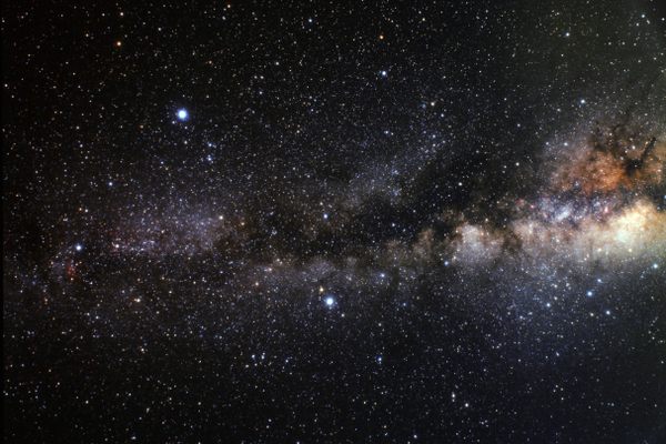 The Summer Triangle dominates the left side of this image: Vega is the bright star at top left, Altair appears just below the center of image, and Deneb at far left.