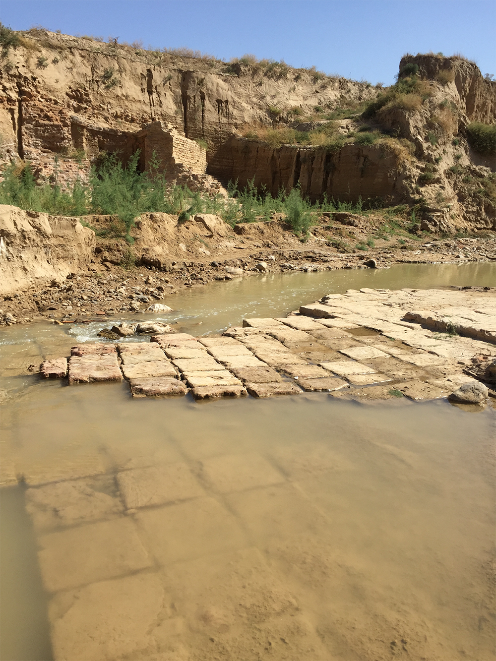 Even the river bed was diverted and channeled through the wall’s structures.