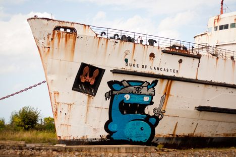 Rusting Hulk of a Ship in Wales Revived with Street Art 