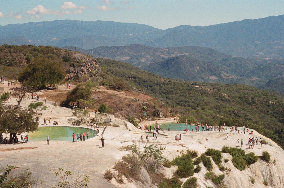 Hierve El Agua offers both a petrified waterfall and a refreshing swim in the Oaxaca Mountains. 
