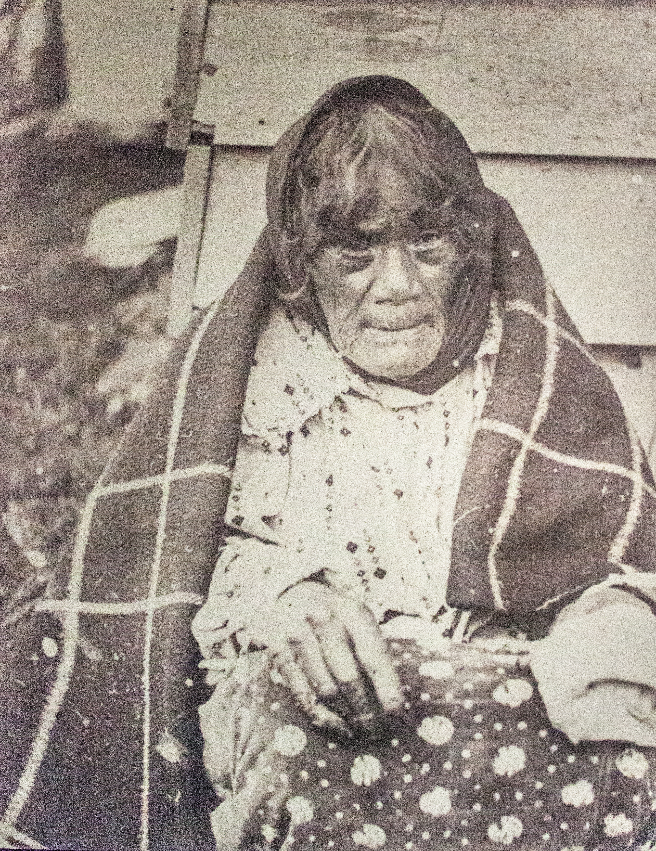 A late 19th-century photograph of a Moriori woman in Western clothing.