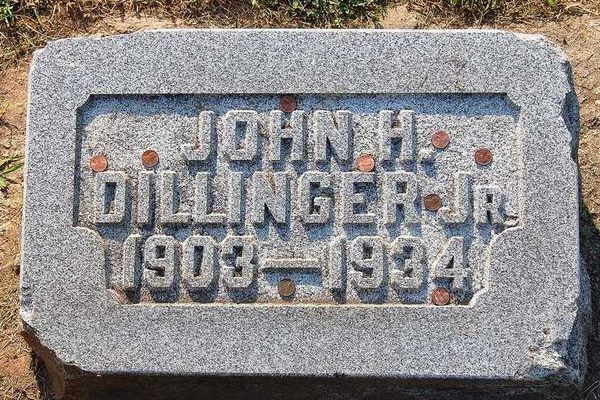 John Dillinger's headstone, chipped by souvenir hunters.
