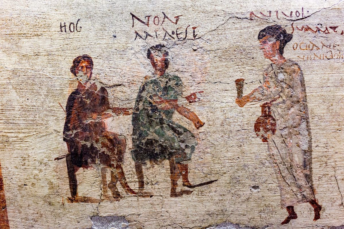 A fresco depicting tavern life in Regio VI of Pompeii.