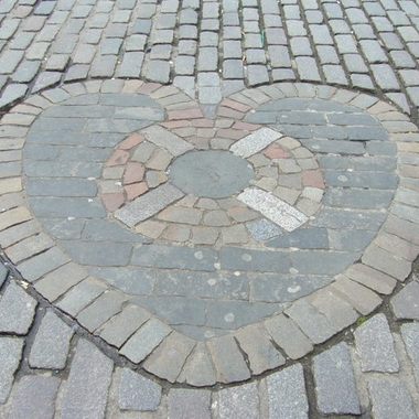 The Heart of Midlothian marks the former entrance to the Old Tolbooth.