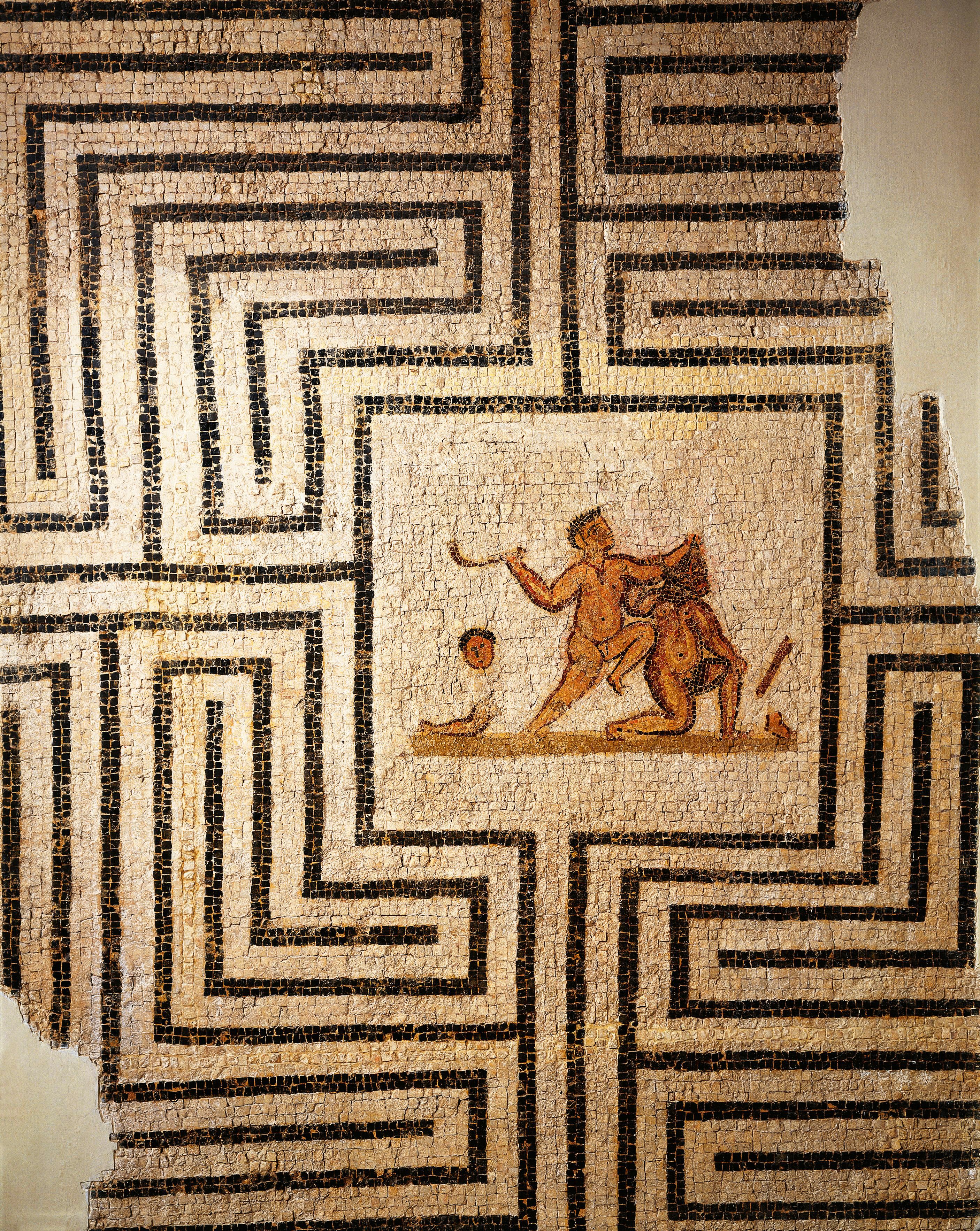 A mosaic from the Roman site of Thuburbo Majus in Tunisia depicts Theseus and the Minotaur. 
