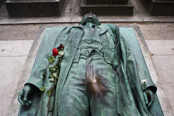 The effigy of Victor Noir, with a spot conspicuously rubbed clean.