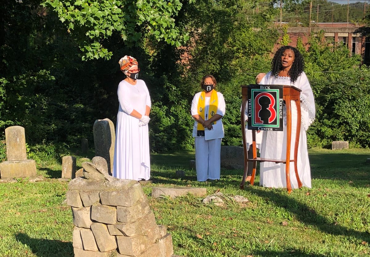 Reverend Renee Kesler (right), president of Knoxville’s Beck Cultural Exchange Center, speaks at the 2020 August 8 ceremony.