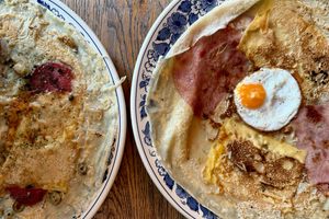 A runny-yolked egg is the crowing glory to a ham-and-cheese pancake.