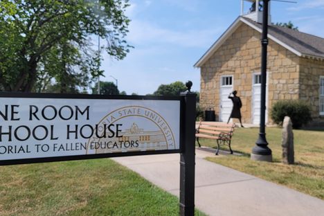 The entrance to the schoolhouse and memorial.