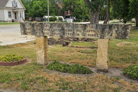 The inscription of the Porky Pig Memorial.