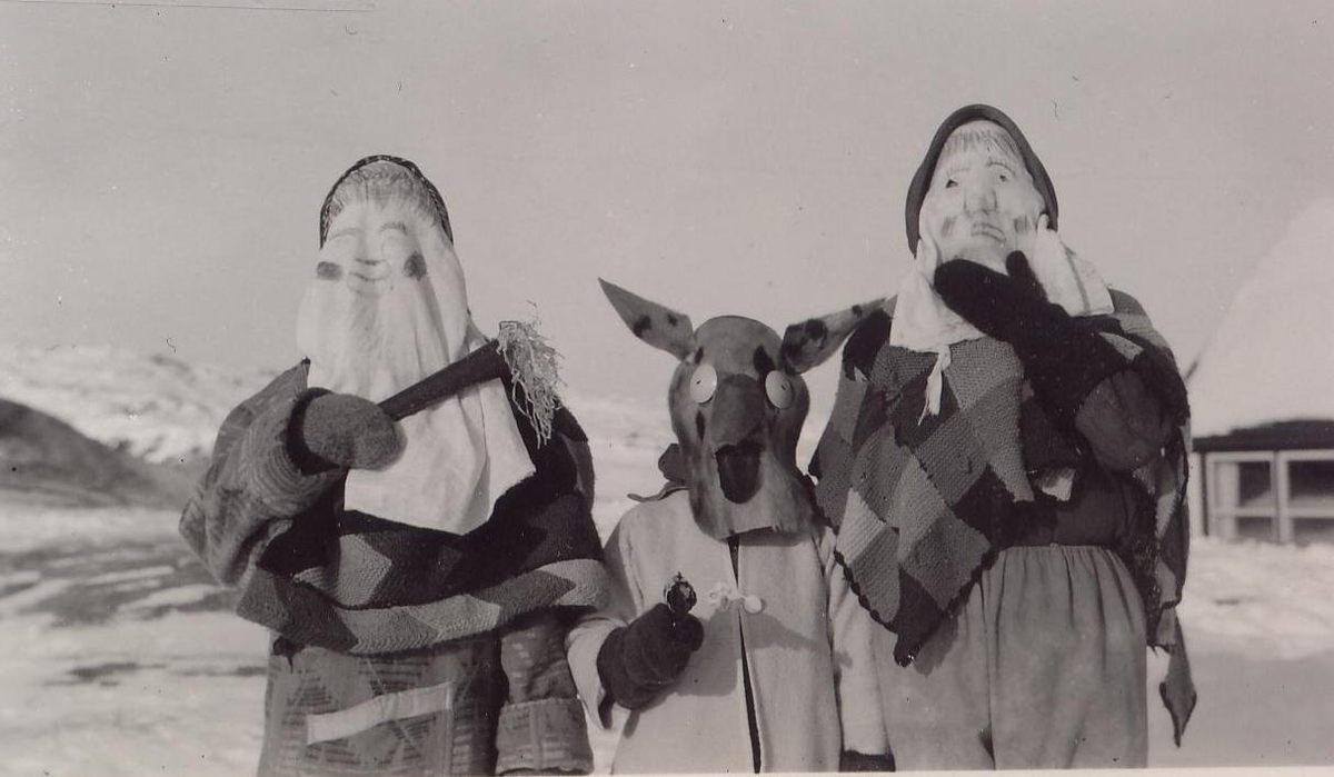 Unknown mummers in Harrington Harbour, circa 1950s.
