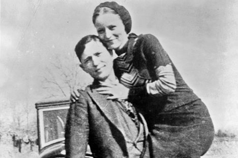 Bonnie and Clyde with their 1932 Ford V8, circa 1932-1934.