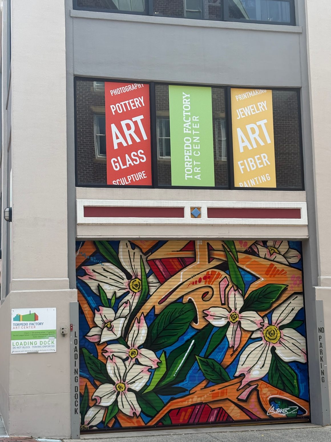 “Even the loading dock has traded military gray for flowers, color, and an inventory of artistic possibilities.”