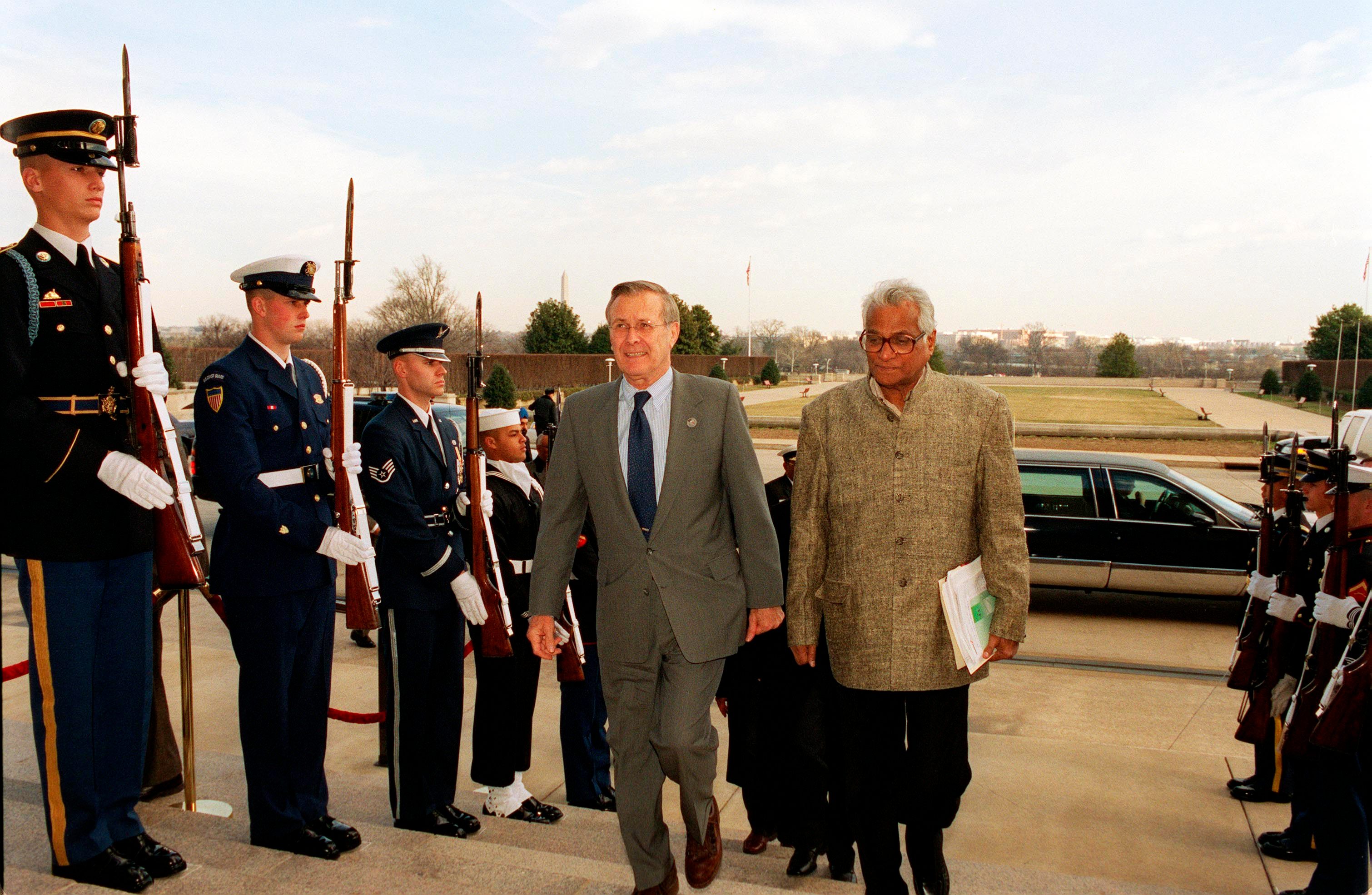 George Fernandes (right) in his role as minister of defense in 2002.