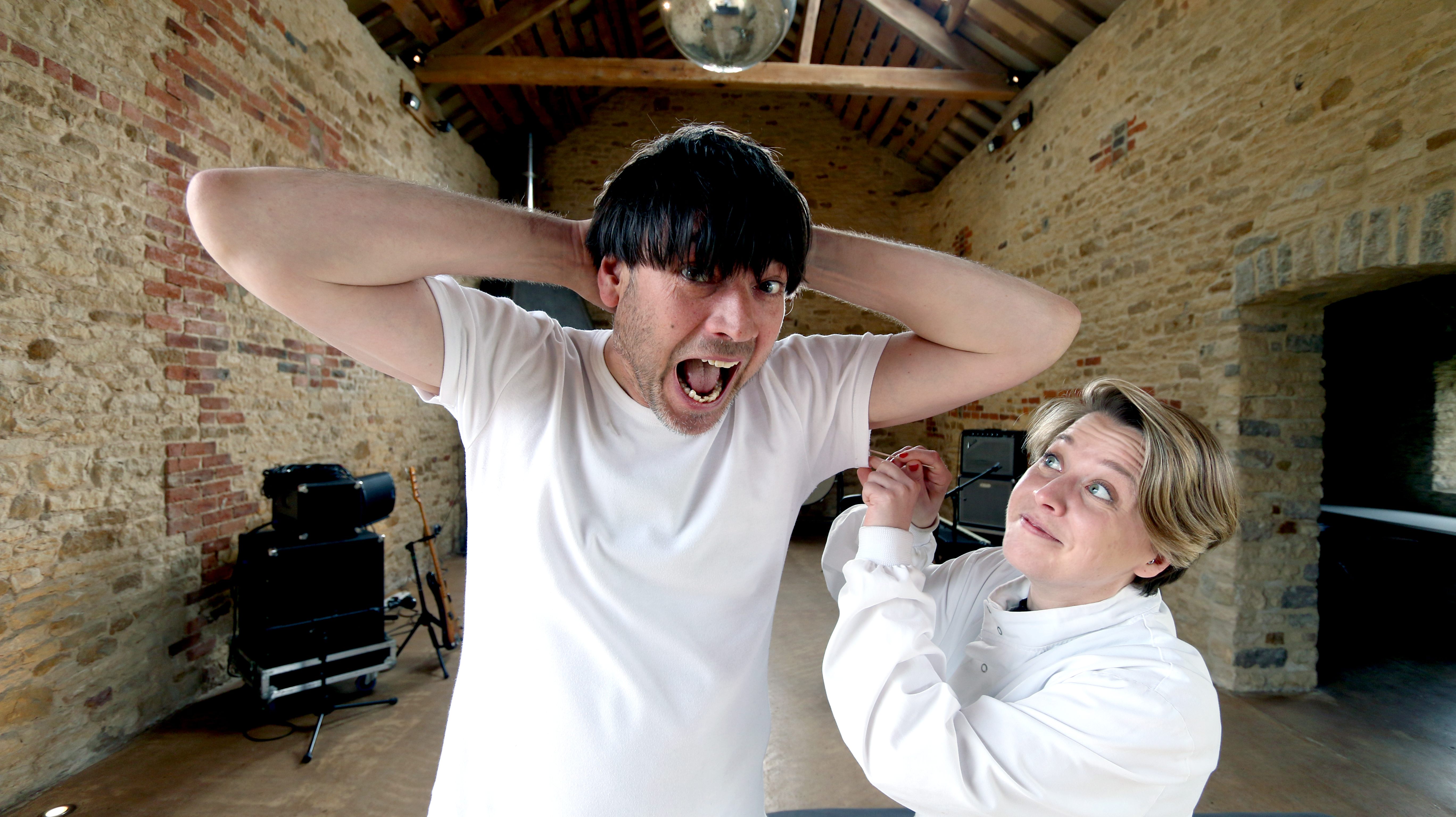 Blur's Alex James raises an arm in support of cheese. Seen with biodesigner Helene Steiner.