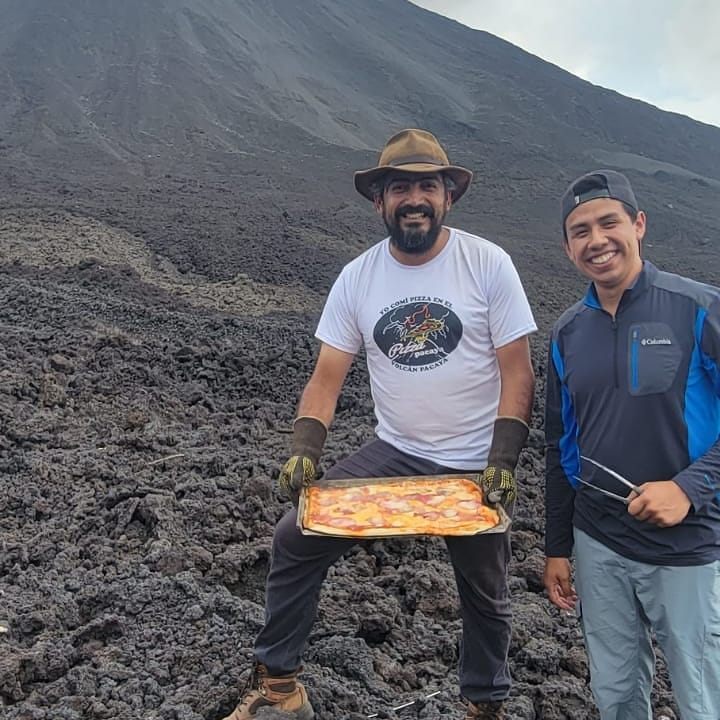 Mansilla (left) with a pie cooked on the volcano.