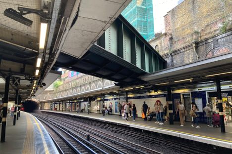 he River Westbourne flows above the station in a large iron conduit.