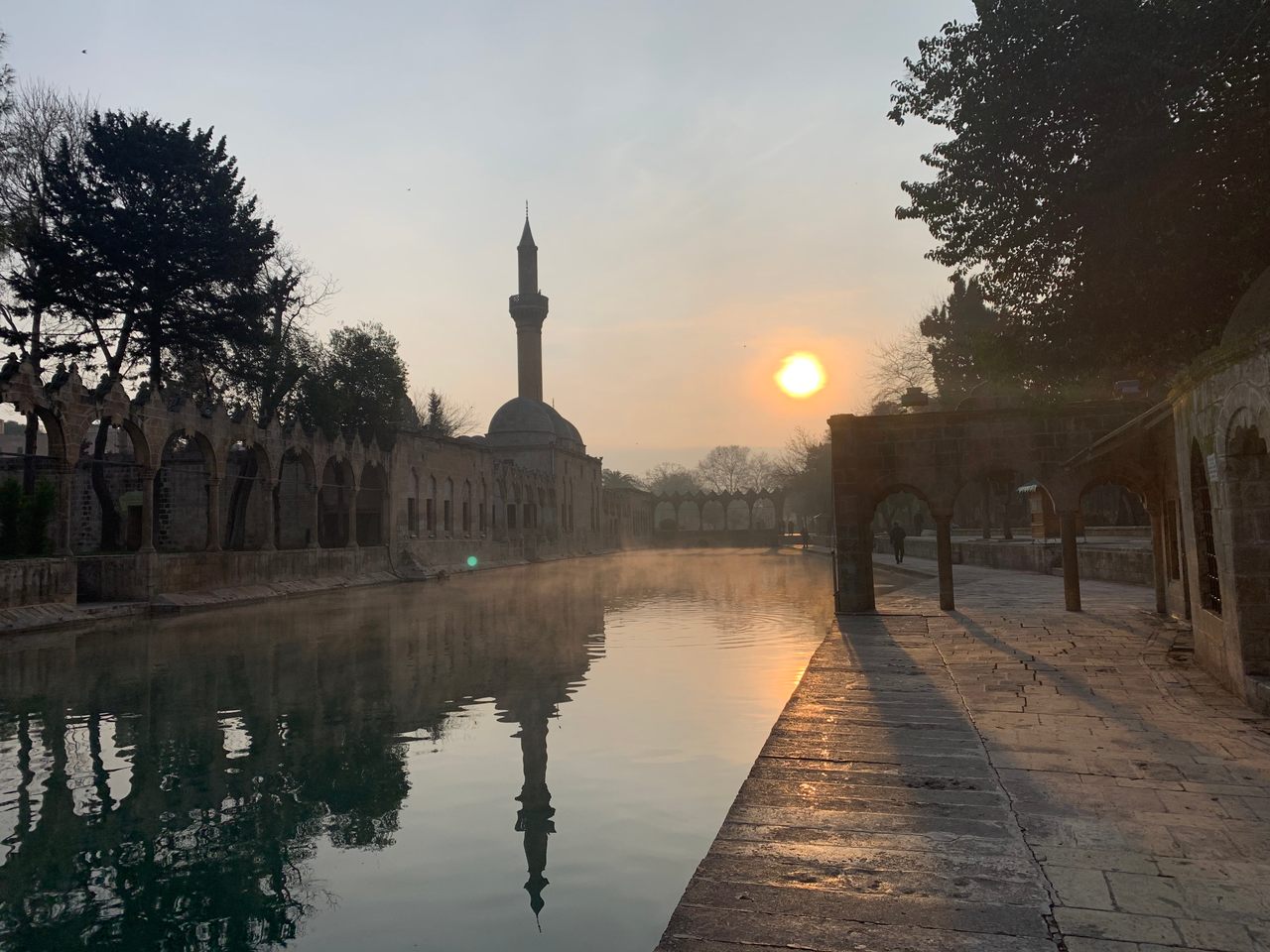The sun rises over the Pool of Abraham in the former Crusader city of Edessa (modern-day Urfa, Turkey), where Jerusalem's first queen, Arda of Armenia, as well as her successor, Melisende of Jerusalem, were both born almost a thousand years ago.