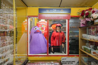 Visitors can see Grimace, mannequins of McDonald's employees in uniform, and the Hamburglar (standing behind the mannequin).