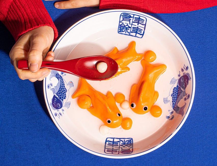 The word goldfish, or <em>jīnyú,</em> sounds exactly the same as the words for "gold and jade."