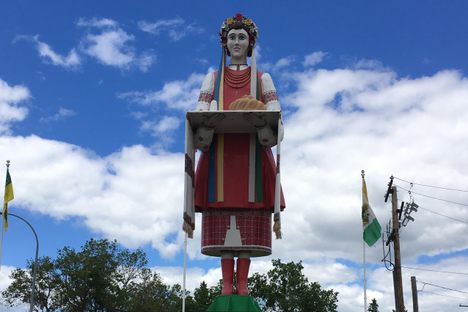 The statue welcomes visitors to Canora.