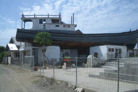 The boat was stranded and left in place.