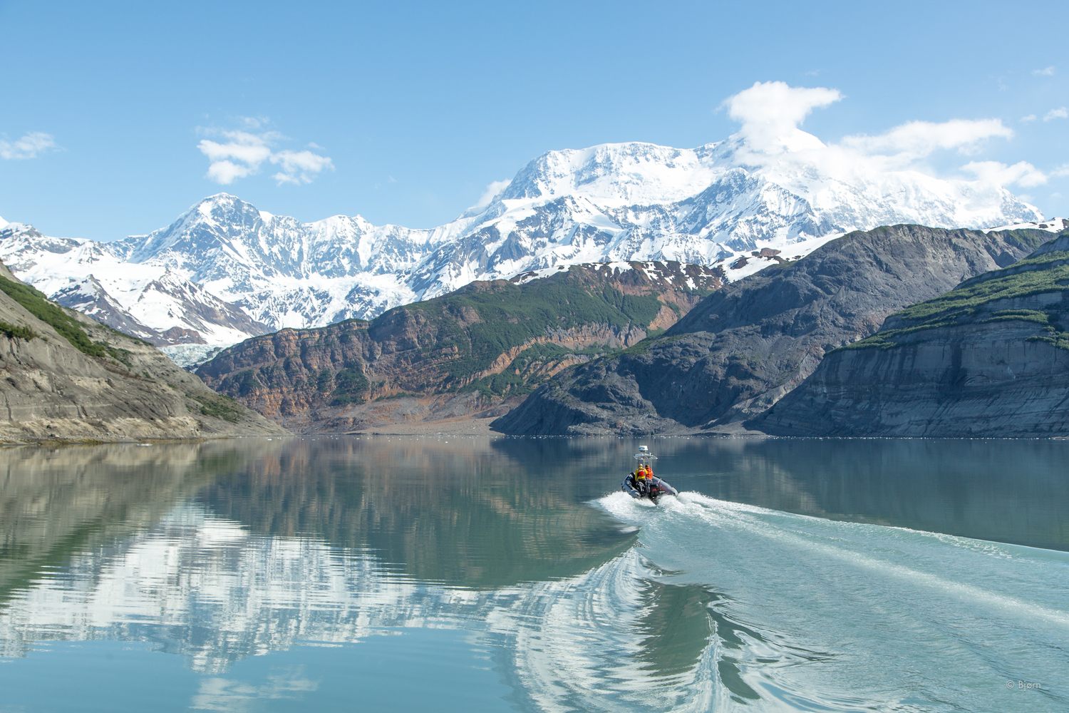 Wrangell-St. Elias Ranger Jim Capra drives his skiff into Taan Fjord.