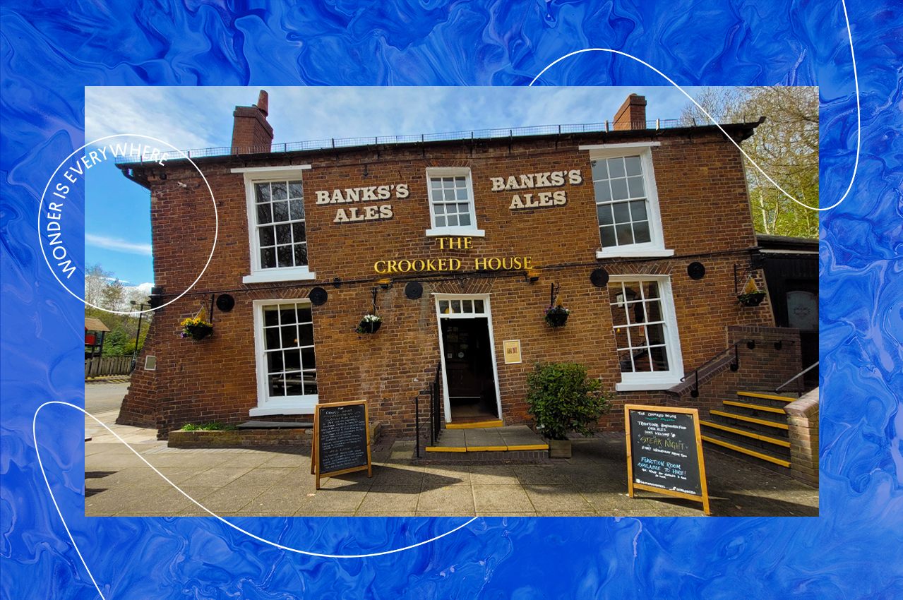 The Crooked House pub in Staffordshire, photographed in April 2023. A brick-built public house. The building was severely affected by subsidence.