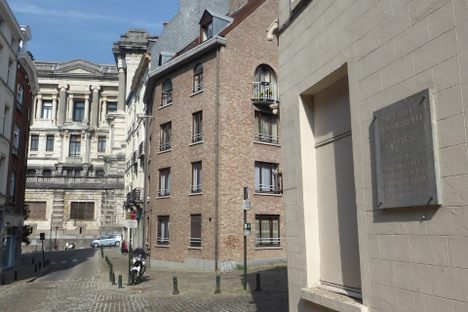 The courthouse visible at the end of the street.