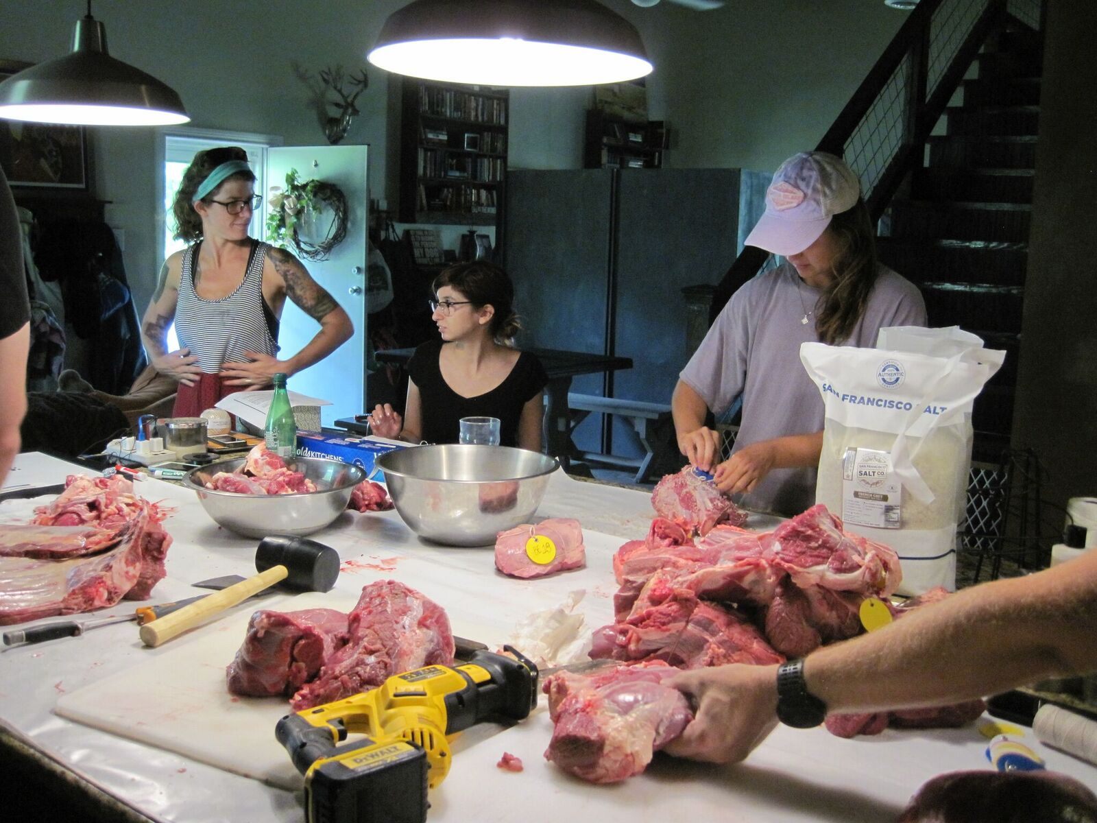 Butchering the beef that would later be salted and brined.