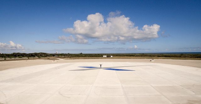 A human awaits the new rocket overlords at Landing Zone 1.