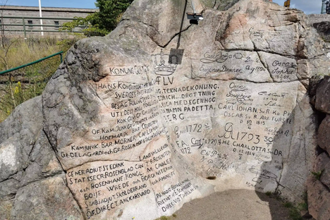 Royal signatures carved onto the rock