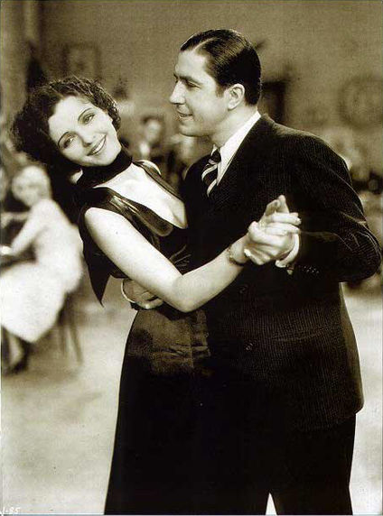 Carlos Gardel and Mona Maris dancing tango in the 1934 film <em>Cuesta Abajo</em>