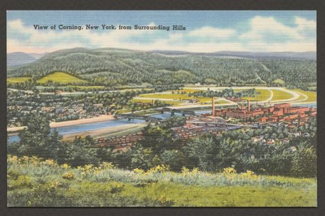 Postcard depicting a view of Corning, New York, from surrounding hills.
