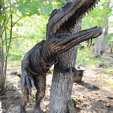 The wooden dinosaur at the start of the sculpture path.