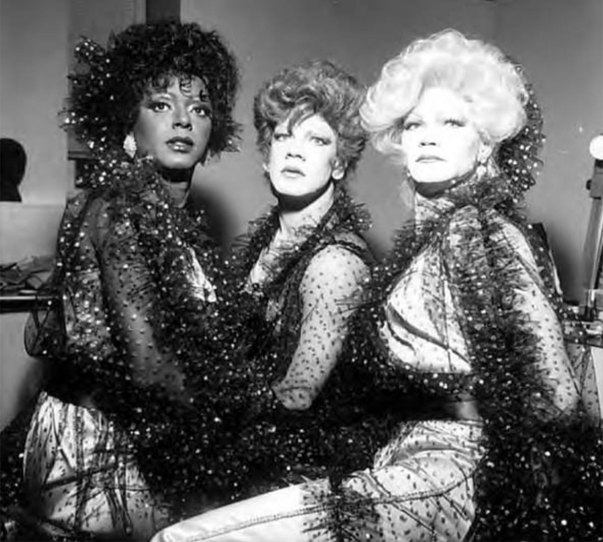 Drag performer Billie De, center, with two other performers at the Dreams and Illusions AIDS Benefit held at Broadway Performance Hall, Seattle Central Community College, Washington, April 24, 1983.