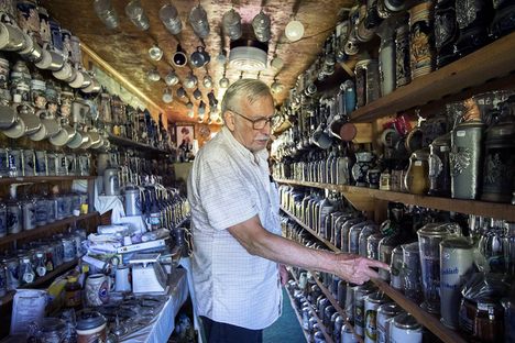 George Adams draws on his thousands of steins to tell stories about beer and drinking.