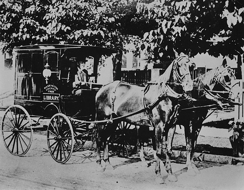 One of the earliest book wagons in the United States, the Washington County Free Library, Maryland, c. 1905.