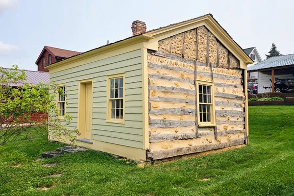 One side of the Dodge Mining Camp Cabin was exposed to its original 1827 appearance.