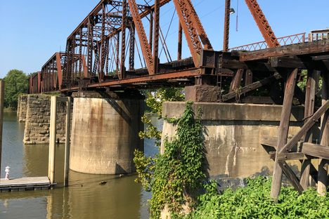 If you expand this picture of the round bridge pier, you can see the large turning gear under the bridge structure.