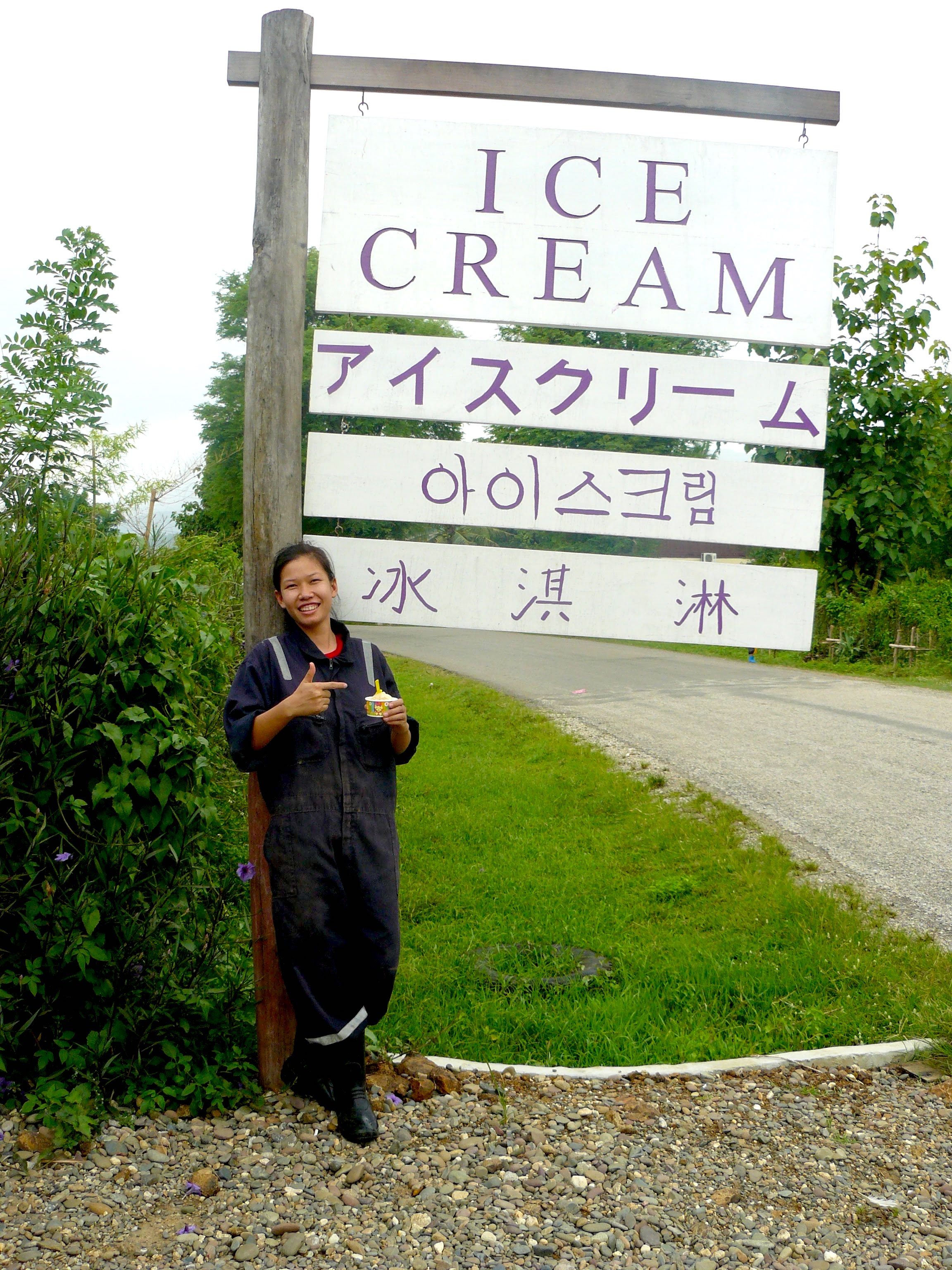 Saisamone Chittaphong, a calf specialist, stands in front of the ice cream locale with her favorite, caramel.