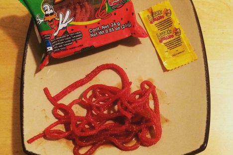 Spicy-sour noodles plus a packet of tamarind sauce equals a delightful snack.
