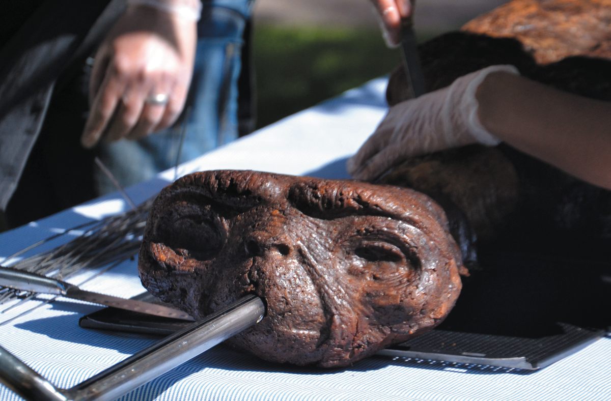 Terje Östling and Unsworn Industries, <em>Eating E.T.—Mock Alien BBQ</em>, 2014.