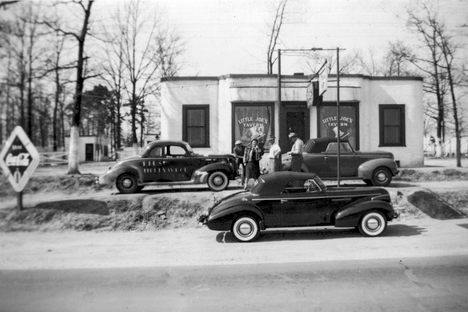 Joe Littlejohn's racecar (No. 7) is seen outside “Little Joe’s” tavern in the late-1930s.