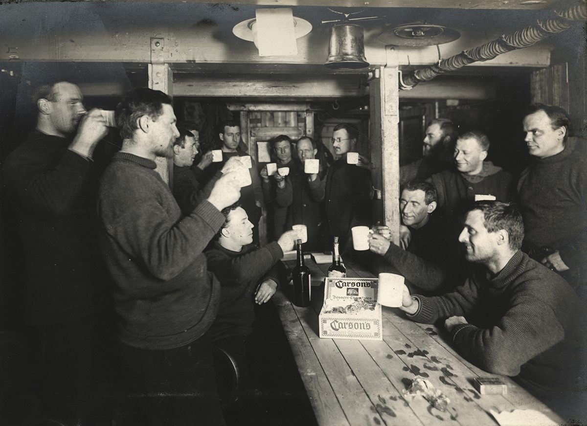 A toast on board the Endurance during Shackleton's Imperial Trans-Antarctic Expedition, 1914-17.