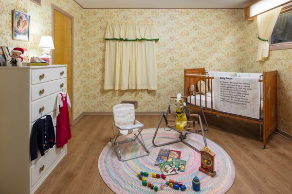 The nursery showcases metal toys and shares information about the Baby Boom years inside the 1950s All-Electric House. 
