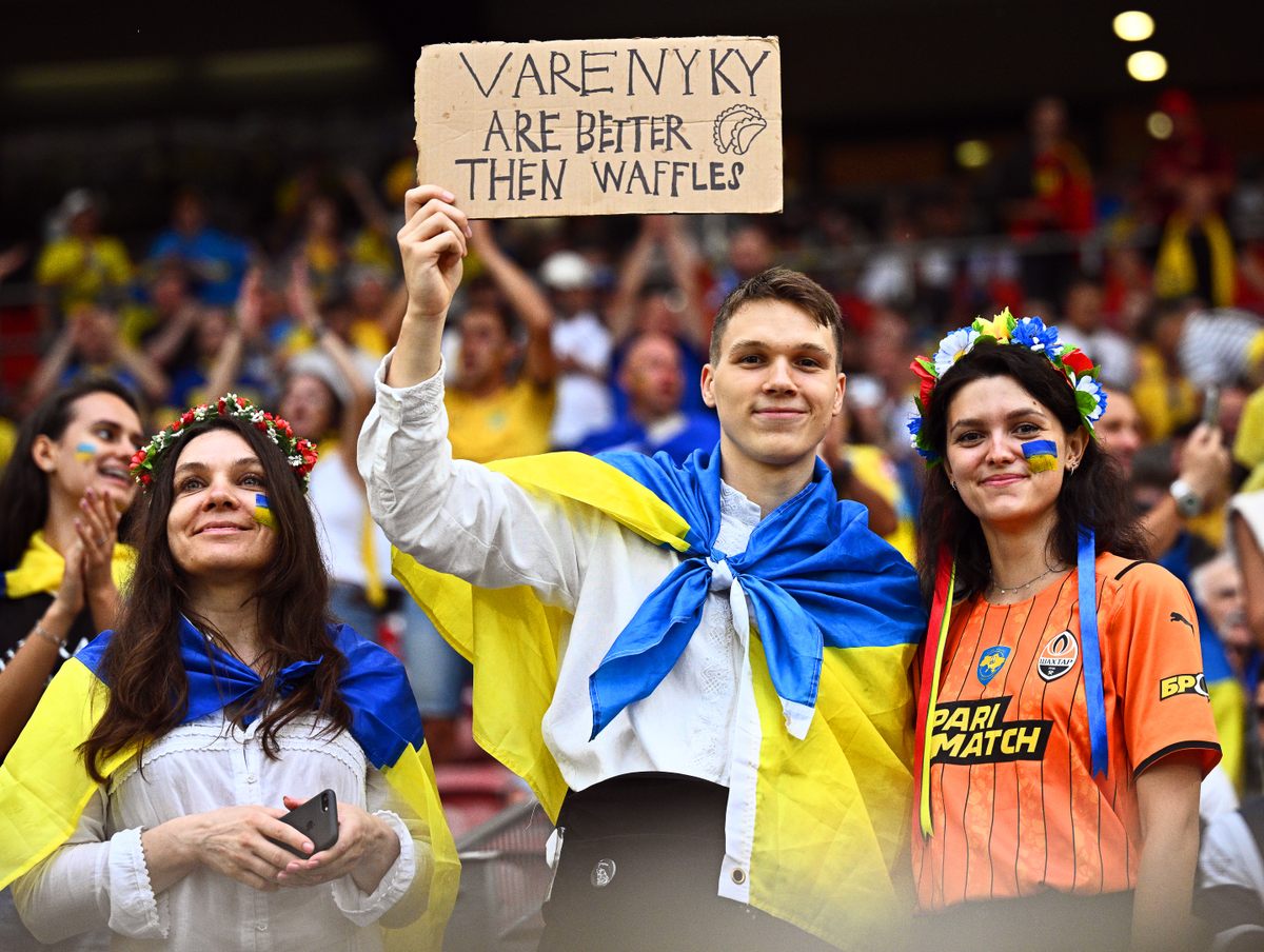 A Ukrainian soccer fan mocks Belgian waffles.