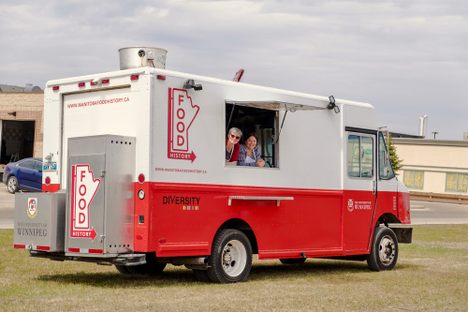 Janis Thiessen and Sarah Story await fresh recipes and stories from inside the Food History Truck.